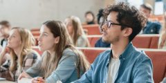Students in a lecture theatre conentrating
