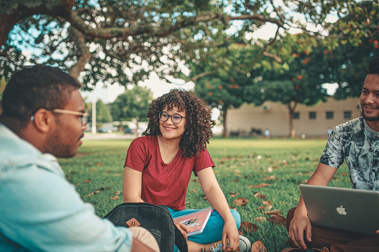 Students chatting on the grass