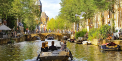 In a rowing boat on a canal in Amsterdam