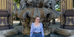 Lauren Ogden in front of a water feature in France