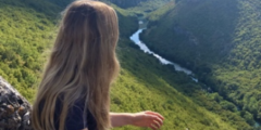 Ellen Blackwell sitting looking at a landscape