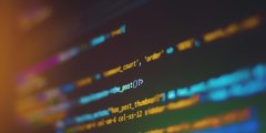 A screen with code on