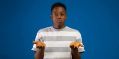 Male looking unsure with his hands out in a gesture of uncertainty