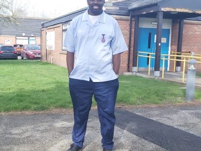 Anthony Irogue in his support worker uniform