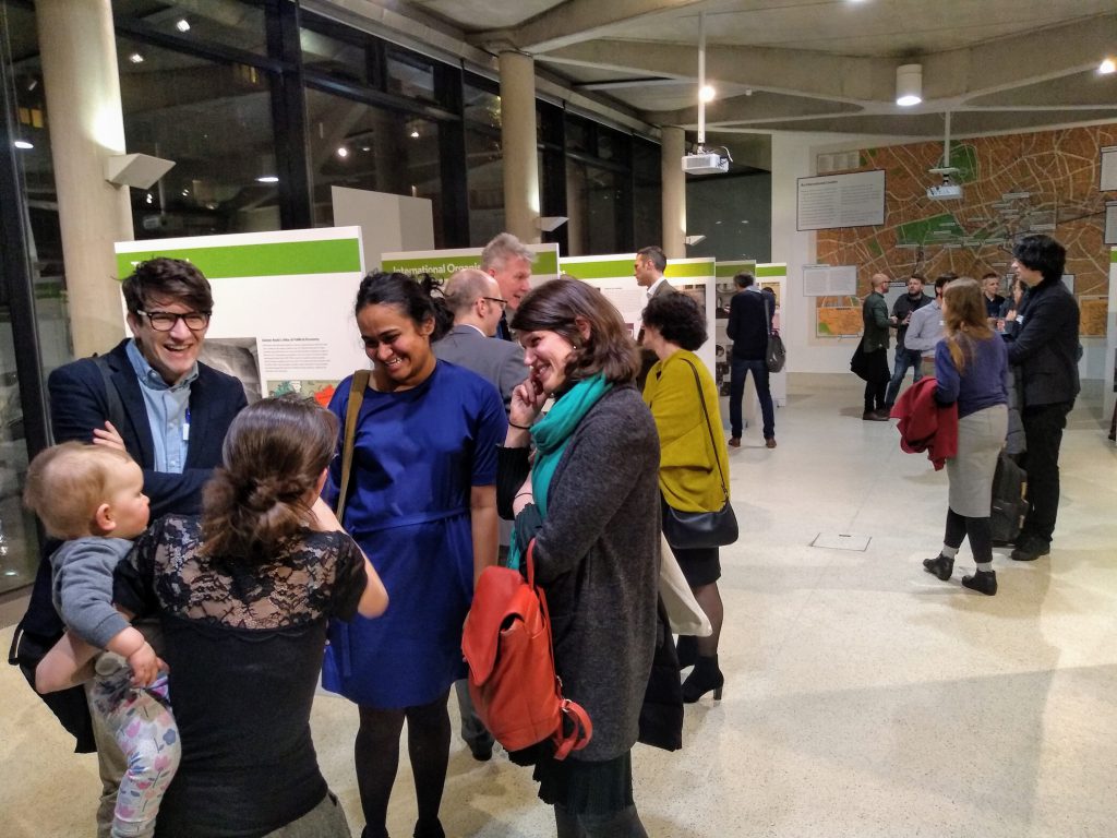 Photograph of delegates in the "Spaces of Internationalism" exhibition