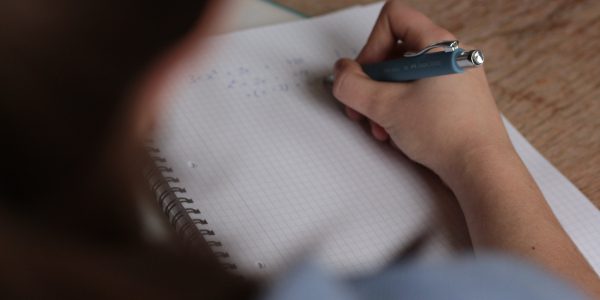A student completing an exam.