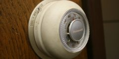Picture of Honeywell's iconic model T87 thermostat, also called "The Round". There is one of these in the Smithsonian. Classic 20th-century Americana.