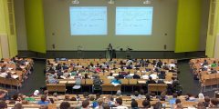 A lecture theatre filled with students.